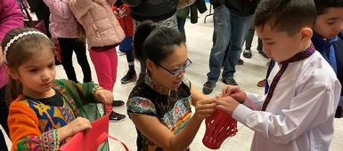Visitors to Allen Road Elementary School's Winter Wonderland Learn About Various Cultures, Including Chinese